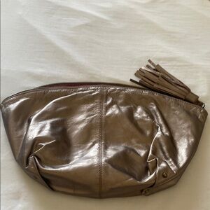 Jasper & Jeera Metallic Leather Clutch with Tassel